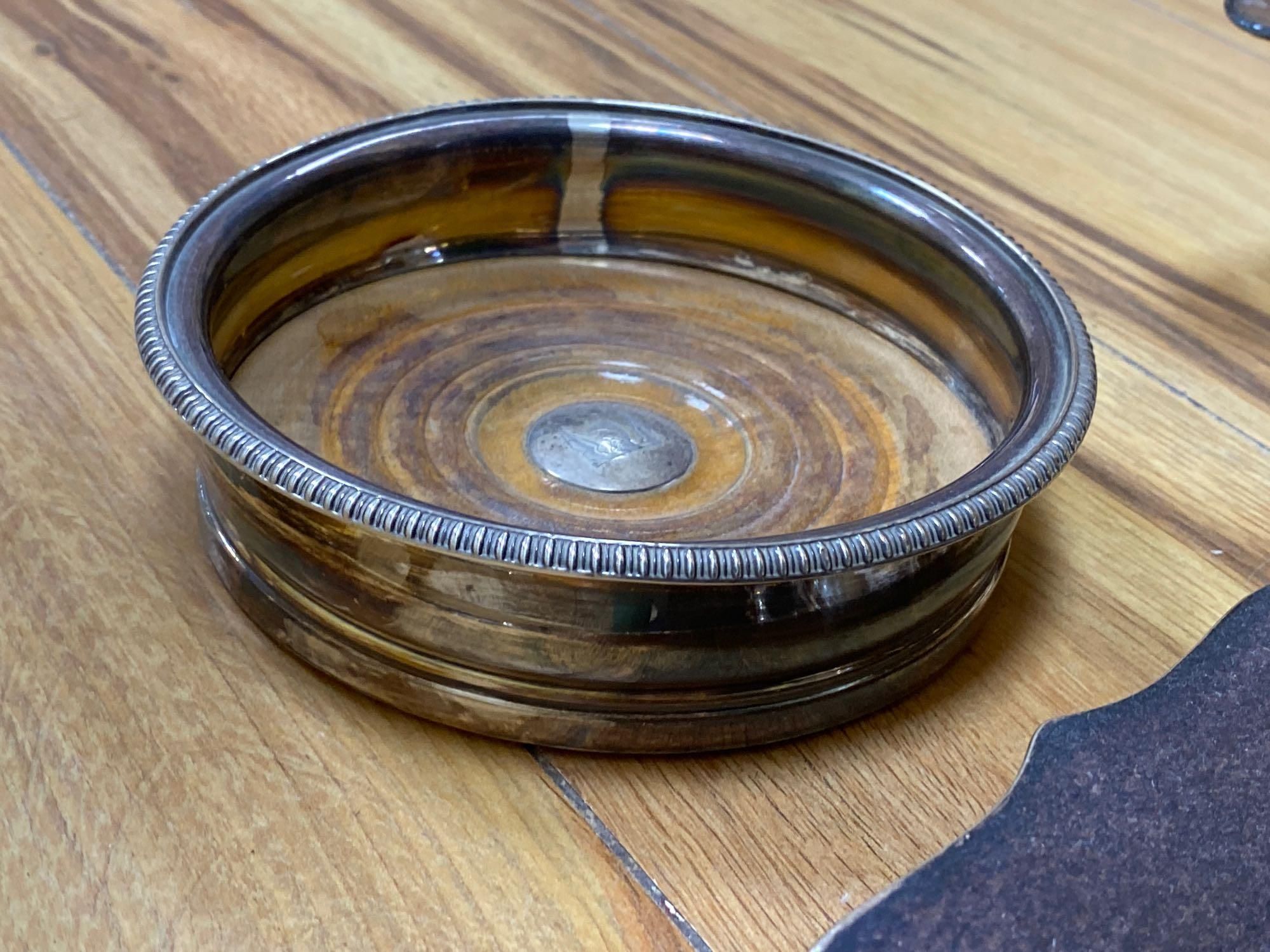 A large Walker & Hall oval plated two handled tea tray, a coaster, a crumb tray and sundry plated wares